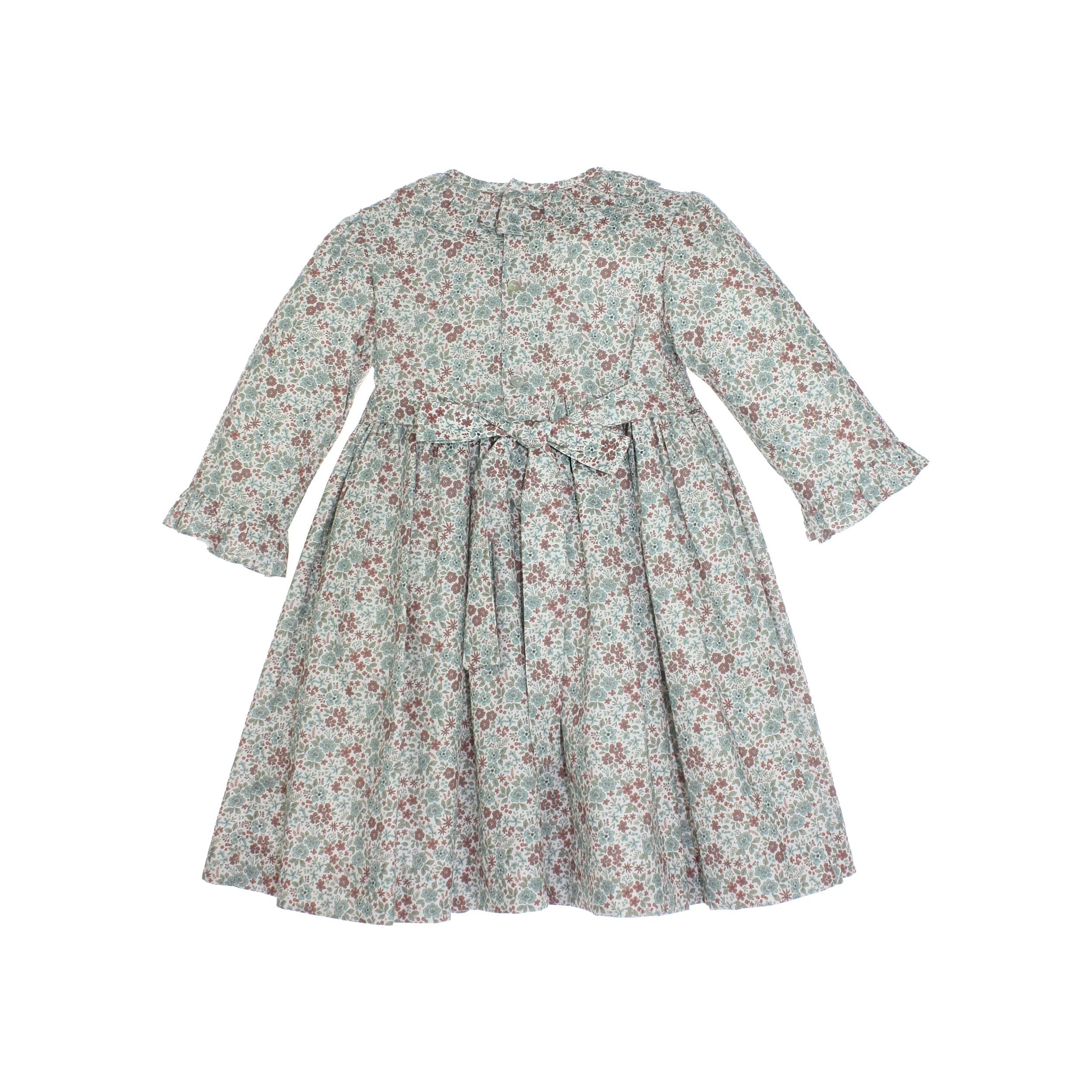 Floral dress with long sleeves on a white background