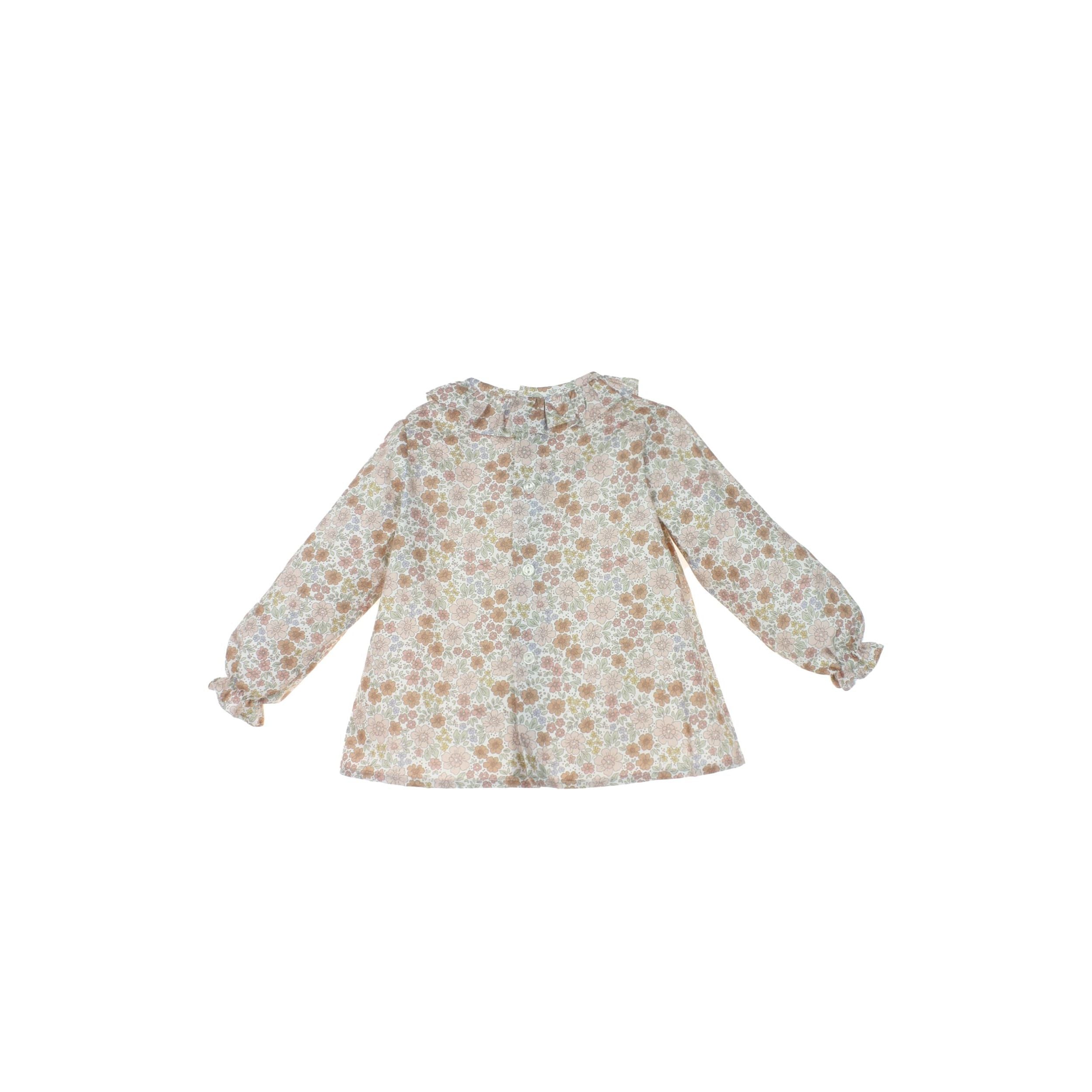 Floral patterned dress on a white background
