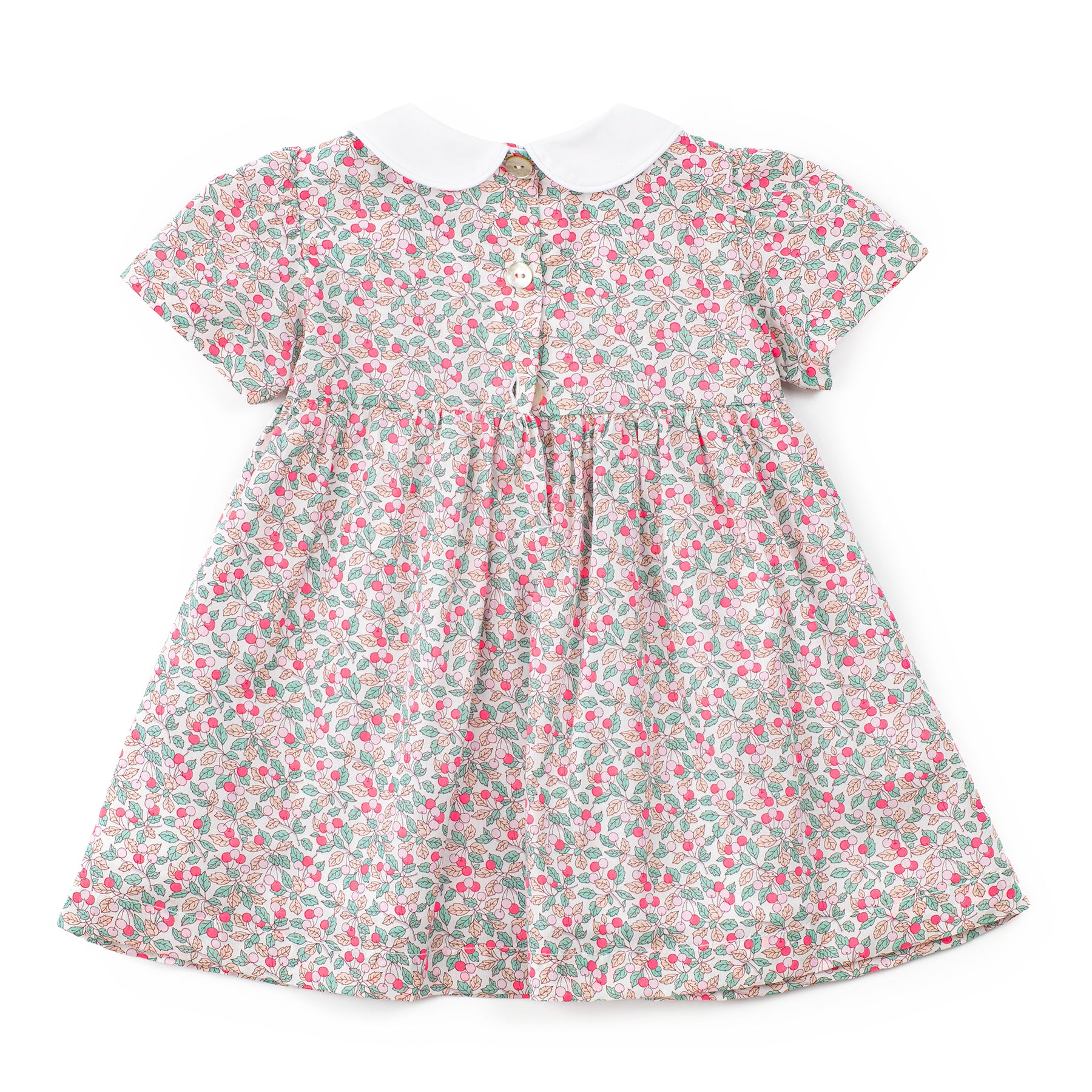 Floral patterned dress on a white background