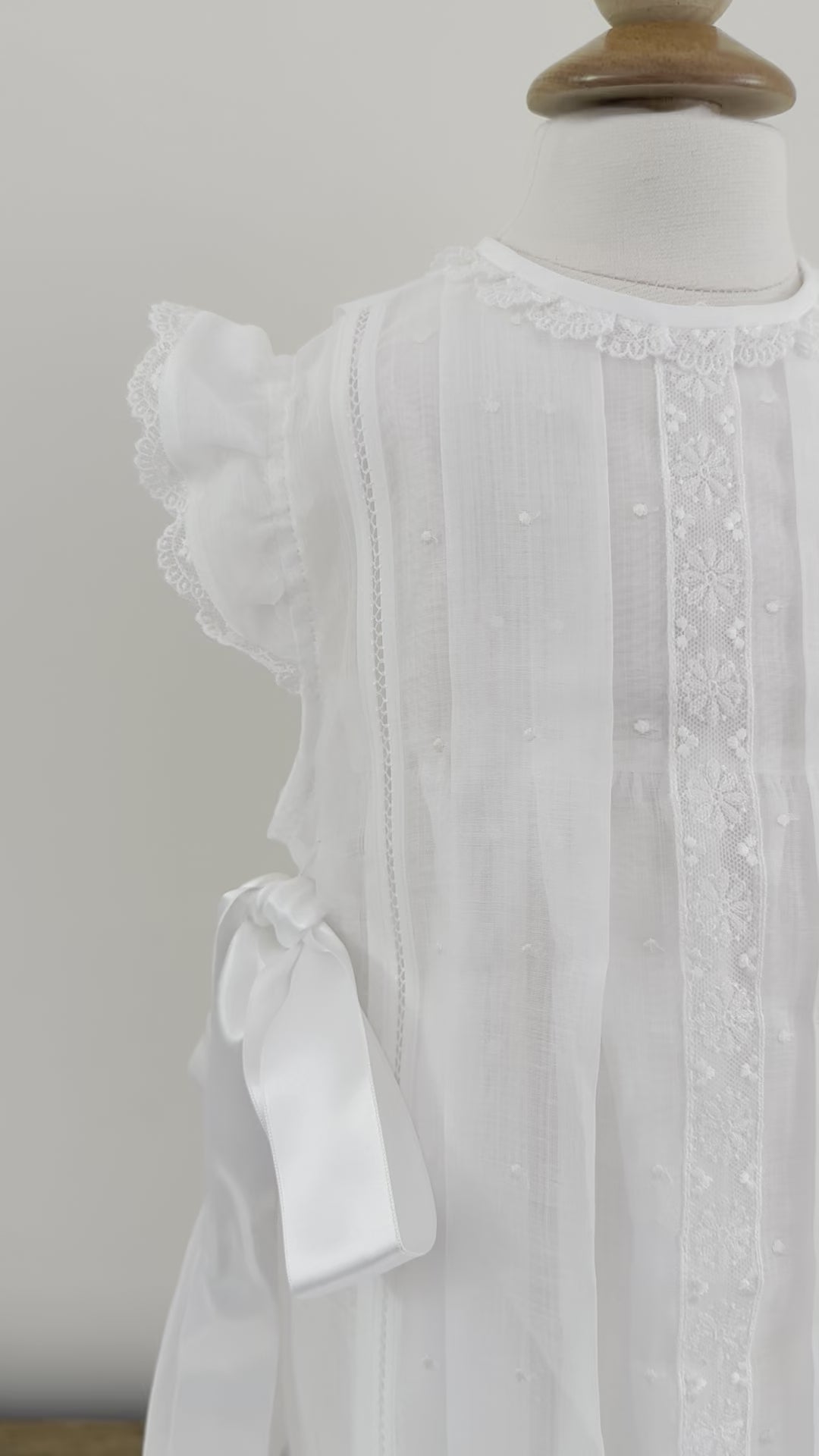 video of Florence White dress Made by Spanish brand, Creaciones Charo. 