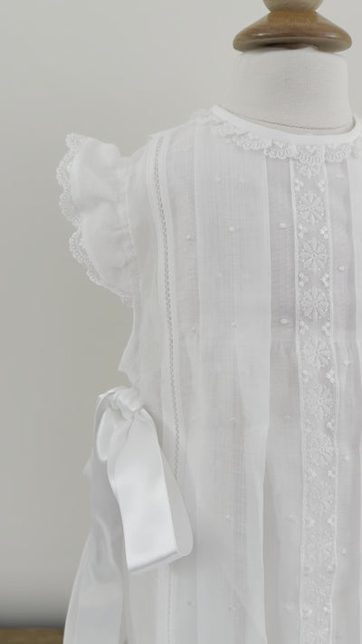 video of Florence White dress Made by Spanish brand, Creaciones Charo. 